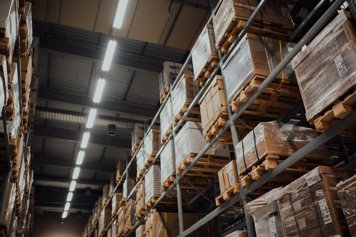 Warehouse racking with packed cartons